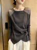 Camiseta gris de manga larga estilo coreano para mujer, nuevo modelo de otoño con decoración de botones, empalme de malla, cuello redondo y diseño juvenil