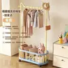 Perchero estilo Dopamina, perchero simple de pie, móvil con ruedas, perchero engrosado para dormitorios estudiantiles