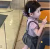 Ropa infantil coreana overol para niñas 2026 verano diseño elegante y dulce tirantes florales pantalones cortos finos para bebés niñas