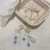 Pendientes hechos a mano con borlas de cuentas de flores estilo vacacional junto al mar pendientes estilo hada estilo Mori atmósfera exagerada pendientes largos