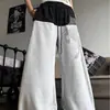 Street Americano Año del Caballo Tachuelas Cuadradas Pedrería Pantalones Cálidos Hombres y Mujeres Sentido del Diseño Bloque de Color Baile Sueltos Deportivos Scimitar Pantalones de Pierna Ancha