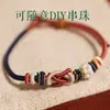 Pulsera de Nudo Dimple Flor de Durazno Tejida a Mano DIY Usable con Cuentas de Transferencia Doradas y Cordón Rojo como Regalo para Tu Novia