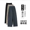 Calças pantalona de tamanho grande, cintura alta, levemente elásticas, versáteis e que afinam a silhueta, perfeitas para o outono de 2026, com um design fluido e casual estilo terno.