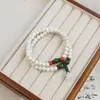 Novos braceletes de cerâmica feitos à mão com contas de Jingdezhen para mulheres, apresentando um estilo chinês moderno, design versátil e uma estética de alta qualidade; atacado disponível