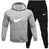 Traje de suéter con capucha y forro polar para hombres y mujeres de Europa y América. Traje de ocio deportivo de moda europea y americana en stock.