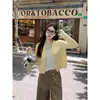Chaqueta cárdigan negra 2026 nuevo suéter de moda de otoño para mujer principios de otoño estilo coreano prenda exterior top de punto