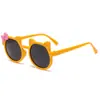 Gafas de sol para niños al por mayor, lindas gafas de sol infantiles con lazo de dibujos animados, gafas de sol para niñas a prueba de sol multicolores en stock