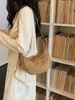 Bolso pequeño de lona de color liso para mujer, nuevo modelo 2026, bolso tipo empanada casual versátil de nicho, bolso cruzado para el día a día, bolso de hombro