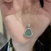 Popular Collar de Buda Maitreya de Yufan Jewelry para Mujer con Diamantes, Cadena de Clavícula de Alta Gama, Estilo de Lujo Ligero de Nicho de Alta Gama 2025