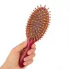 Explosivos transfronteiriços pente de sândalo dourado pente de sândalo pente de cabelo meridiano massageador draga pente de massagem pente de almofada de ar