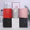Bolsa de Regalo de Cartulina Blanca Estampado en Caliente de un Lado en Relieve por Ambos Lados Comercio Exterior Transfronterizo La Más Vendida Bolsa de Papel Bolso de Mano de Alta Gama Venta al por Mayor