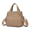 Bolso de Mano de Múltiples Capas de Gran Capacidad a la Moda para Comercio Exterior, Bolso de Hombro Simple de Nylon Nuevo 2026, Bolso Cruzado para Mujer
