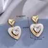 Novas brincos de zircônia com temperamento de personalidade amor brincos femininos design requintado de coração de pêssego joia de orelha Joker atacado
