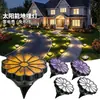 Luzes solares de gramado para exterior, com decorações de margaridas artificiais e borboletas, são luzes solares de jardim criativas projetadas para instalação no solo.