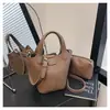 Bolso de Mano Tipo Cubo de Piel Sintética Suave Estilo Coreano de Nicho para Mujer 2025 Verano Nuevo Bolso de Hombro Cruzado Casual