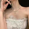 Collar de doble capa de perlas retro francesas, accesorios para mujer, pequeñas cuentas de arroz, gargantilla de cadena de clavícula de lujo ligero y de alta gama.