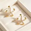 Novos brincos de design minimalista criativo da moda transfronteiriça, brincos de tarraxa de aço inoxidável com pingente de estrela-do-mar e pentagrama com esmalte gota de óleo