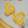 Pendientes de acero de titanio de moda creativa de personalidad de nicho europeo y americano chapados en oro de 18k amor atmósfera de lava pendientes de alto sentido