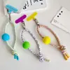 Colgante de teléfono de pompón de hilo de color dopamina de moda, llavero elegante y simple, accesorio para bolso, diseño creativo