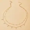 Moda europea y americana cadena de cintura de cadena de bolas de aleación cadena de cintura retro simple luna tridimensional borla colgante doble decoración de cintura