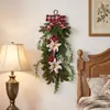 Colgante de pared de planta artificial navideña transfronterizo con lazos, ramas de pino y bayas para decoración festiva de entrada del hogar