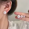 Elegantes Pendientes de Clip de Camelia para Bobina de Mosquito para Mujer Sin Perforaciones, Pendientes de Flor de Perla Estilo Francés de Lujo Ligero de Alta Gama