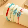 Conjunto de Pulseras Apilables Estilo Divertido de Vacaciones Transfronterizas Europeas y Americanas Pulsera Trenzada de Concha Perla Pescado Cerámico de Color Contrastante Goteando Aceite