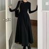 Vestido de manga larga de punto calado estilo Hepburn para mujer, nuevo diseño de primavera y otoño, temperamento nicho, corte entallado adelgazante.