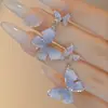 Pendientes de Mariposa Azul Hielo Cristalino de Moda Dulce y Frescos de Verano Aguja de Plata S925 Circonita Microincrustada Pendientes Versátiles
