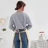 Versión coreana de delantal de dibujos animados impermeable y a prueba de aceite ropa de trabajo de cocina para el hogar fabricantes para imprimir logotipo en el mapa al por mayor