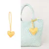 Colgante de Bolso Bufanda con Forma de Corazón Transfronterizo, Accesorio de Bolso de Moda con Borla de Cuero de Gama Alta Estilo Ins