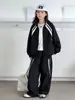 Nuevo conjunto deportivo casual de otoño de corte holgado para niños y niñas, con cuello alto, una chaqueta para usar al aire libre y pantalones de pierna ancha