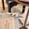 Pinza para el pelo de terciopelo con forma de corazón y perlas, estilo coreano, color block, nuevo modelo otoño e invierno 2026, pinza de pico de pato para frente y laterales