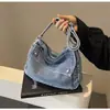 Nova Versão Coreana da Bolsa Transversal Simples Retro Original para Mulheres Primavera & Outono 2026 Bolsa de Ombro de Nicho Bolsa Tote de Alta Qualidade