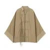 Ropa de mujer transfronteriza al por mayor 2026 moda versátil estilo chino hebilla de nudo cuello mao pequeño color liso blusa top holgada