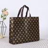 Sacola de Tecido Não Tecido Laminado Espesso Sacola de Compras Portátil para Roupas Sacola de Presente Personalizada para Atacado Transfronteiriço com Fundo e Lado