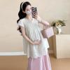 Conjunto de maternidad de dos piezas estilo coreano para el verano de 2025: top con bordado pesado, pantalón y falda con soporte para el vientre.