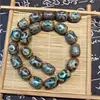 Venta directa de fábrica ágata caqui cuentas de tres ojos cuentas de arroz cuentas de tambor cuentas DIY cuentas de Bodhi accesorios collar pulsera