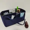 Bolsa interior de fieltro transfronteriza, bolsa de maquillaje de fieltro, bolsa de viaje para mamá con cremallera y múltiples compartimentos, bolsa de almacenamiento de cosméticos multifuncional
