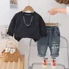 Novedad primavera 2025 traje de suéter estilo western para hombre, suéter de manga larga con estampado de leopardo, conjunto de dos piezas de moda para primavera y otoño