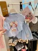 2026 Novo Estilo de Verão Fofo Estampado Shorts de Manga Curta para Meninas de Crianças Médias e Maiores, Conjunto de Roupa Infantil Duas Peças Estilo Coreano