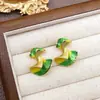 Pendientes de nudo retorcido de esmalte brillante de nuevo estilo, simples y elegantes, versátiles, diseño de nicho, pendientes geométricos de esmalte para mujer