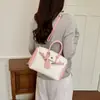 Bolso de mano para mujer 2026 verano alta costura nuevo color block dulce un solo hombro bandolera de viaje elegante versión coreana bolso elegante