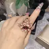 Versa Fashion Pendientes Anillo de Mariposa Fluttering de Gama Alta Micro Incrustación Circonita Chapado en Oro Perla Pequeña Traje Mujeres