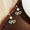 Pendientes de lazo clip para oreja espiral de mosquitos sin perforar mujer coreano suave 2023 nuevo de moda otoño e invierno pendientes de perlas