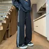 Pantalones casuales de seda helada para hombre de marca moderna, pantalones de rayas con efecto de caída, pantalones largos de retazos de estilo americano de verano, corte recto holgado