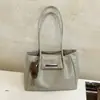 Bolso tote simple estilo coreano nuevo para otoño 2026, moderno y versátil, con una sensación de alta calidad, adecuado para ir al trabajo y se puede llevar debajo del brazo