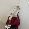 Bolso tote versátil y sencillo para mujer, nuevo modelo 2026, versátil bolso de axila de gran capacidad para el trabajo y los desplazamientos, bolso de hombro y cruzado