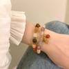 Pulsera de calabaza de seda dorada colorida estudiante novia pulsera para dos nuevo estilo chino estilo nacional pulsera elástica 2023 Nuevo