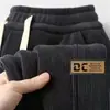 Pantalones de hombre para comercio exterior, estilo fino de invierno, pantalones deportivos casuales, pantalones largos holgados para hombre, pantalones casuales de nuevo estilo para llevar al aire libre